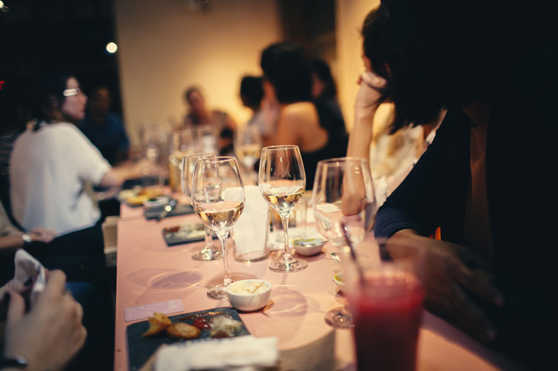 people-having-wine-in-a-restaurant-696214